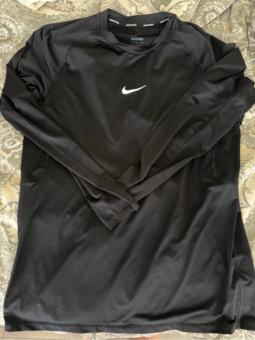 Nike Black Long-Sleeve Performance Top with White Swoosh